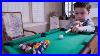 6-Year-Old-Billiard-Prodigy-Playing-With-A-Mini-Pool-Table-01-gis