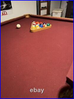 8' Pool table withsticks and balls