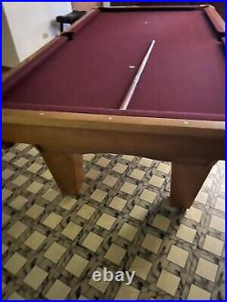 8' Pool table withsticks and balls