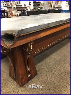 9' antique Brunswick Arcade pool table