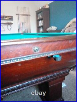 Antique Brunswick Newport style pool table with 1940's Schaaf magazine cushions