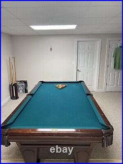 Pool table with pool sticks and balls for sale