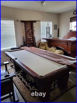 Used 8 Ft. American Heritage Billards Pool Table with Cue Stick Wall Rack